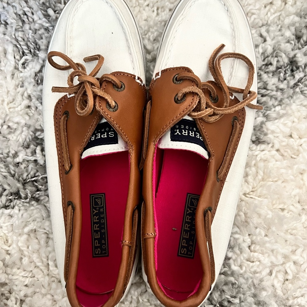 Sperry women’s shoe. Size 8. White with brown laces.